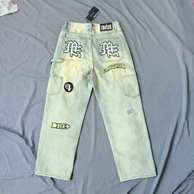 Mixed Emotion Multi‑Patch Distressed Carpenter Jeans Hover Image