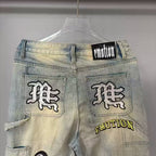 Mixed Emotion Multi‑Patch Distressed Carpenter Jeans